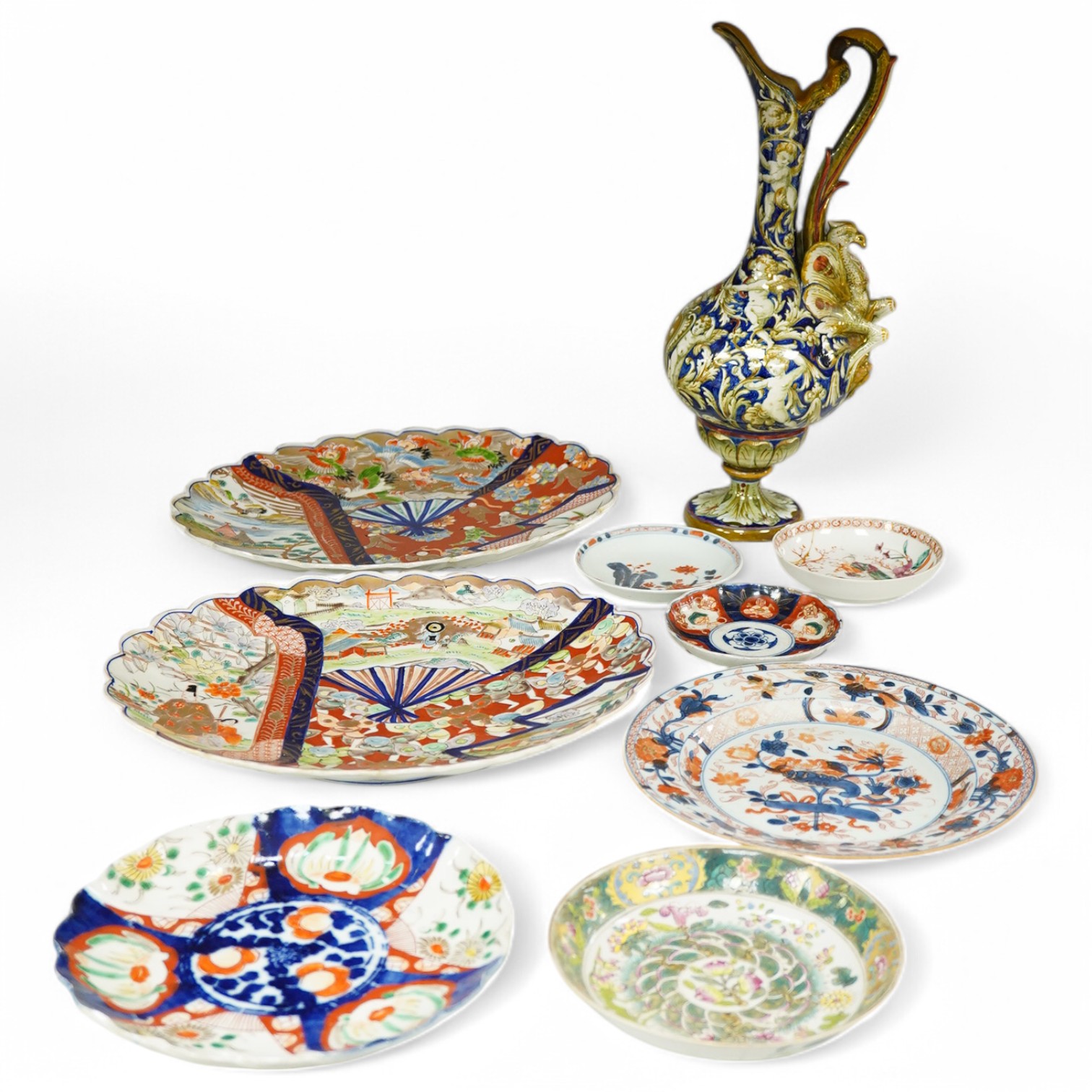 Eight Chinese 18th and 19th century plates and dishes, together with a painted botanical plate and a Cantagalli maiolica ewer, tallest ewer 37cm high. Condition - ewer and a small dish restored, the other items good